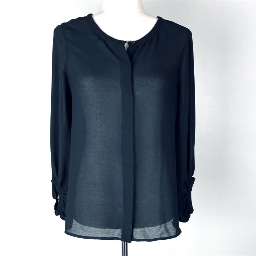 Loft, black button up blouse. Long sleeve, very sheer, very sexy.